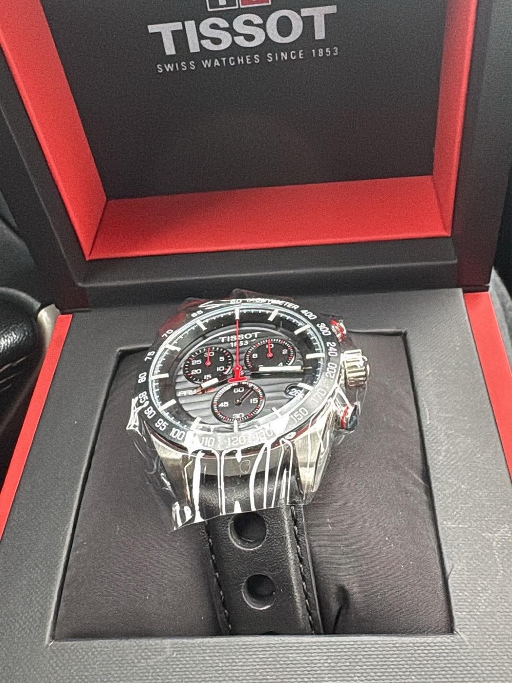 Tissot Black Silver Men's Chronograph Watch with Red Accents